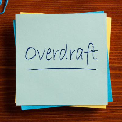 the word overdraft on a bunch of sticky notes